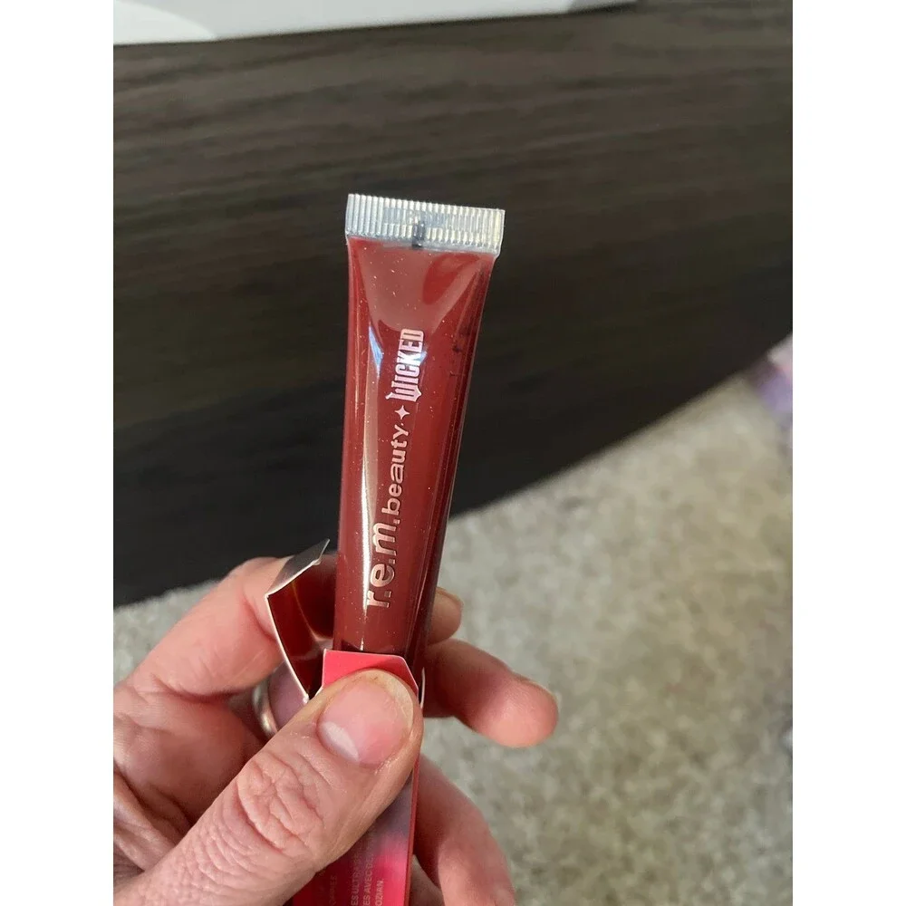 r.e.m. beauty x Wicked: For Good Poppy Plumping Lip Gloss Plum Petals BNIB